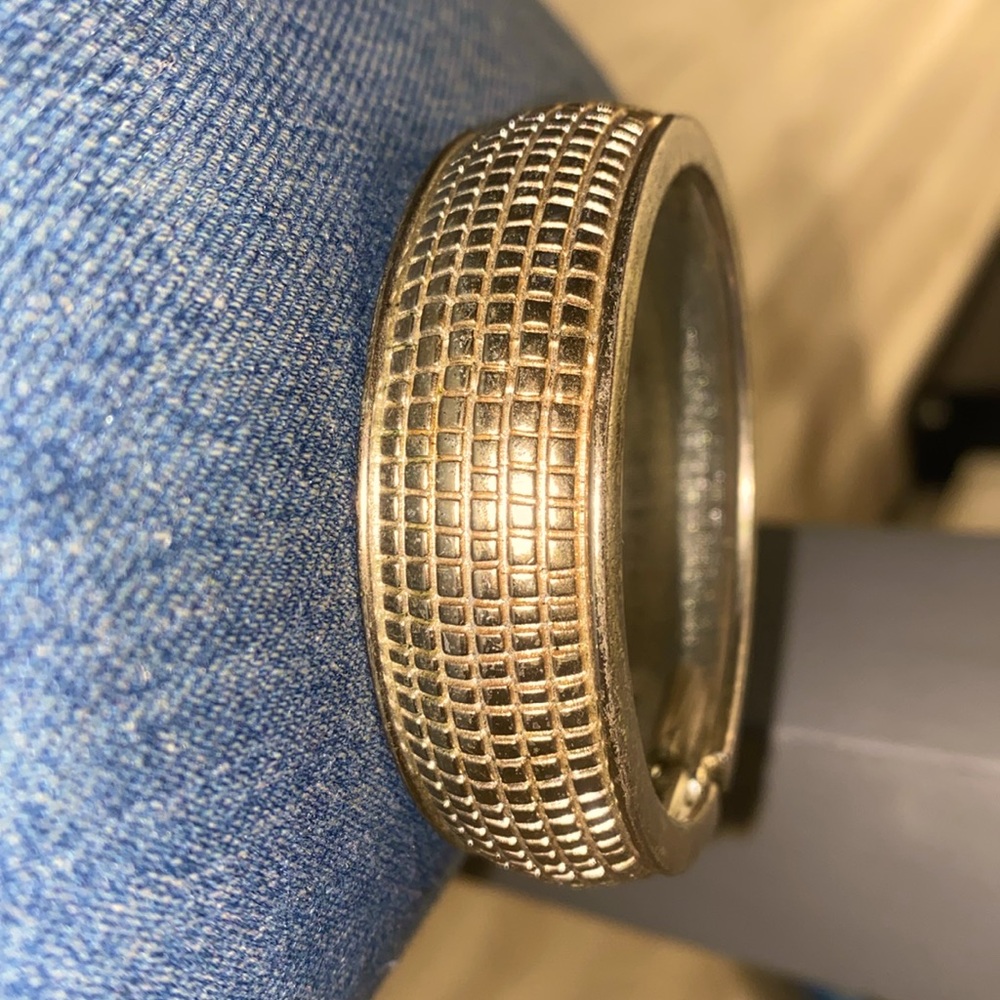 A silver gold ish bracelet from the 90s